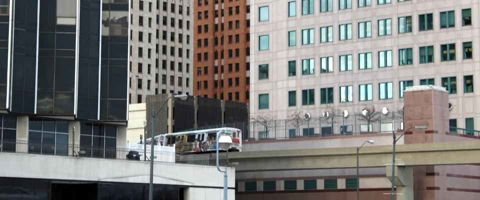 Detroit People Mover on its elevated downtown track, an essential public transit option that helps renters connect to offices, restaurants, and entertainment in the city center