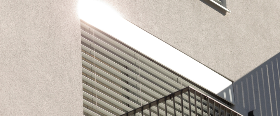 Exterior sun shades and blinds on an apartment building in Phoenix, Arizona, showing energy-efficient design and heat protection for renters when renting in Phoenix.