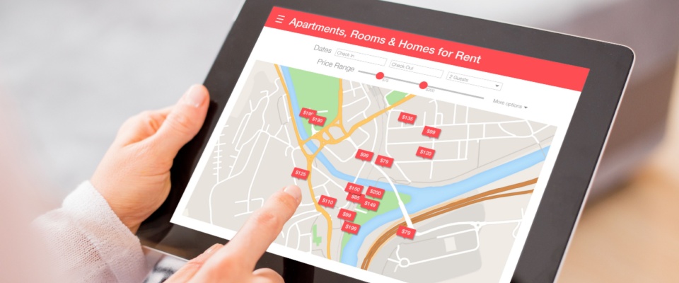 A person looking for apartments after learning the renting basics.