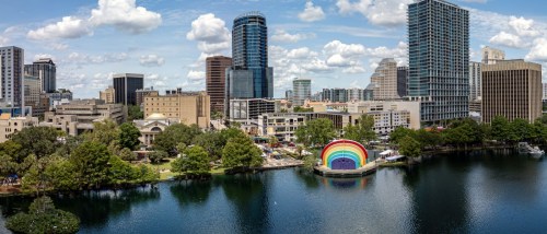 Cityscape with the Rainbow Amphitheater by Lake Eola to illustrate public transport in Orlando, FL.