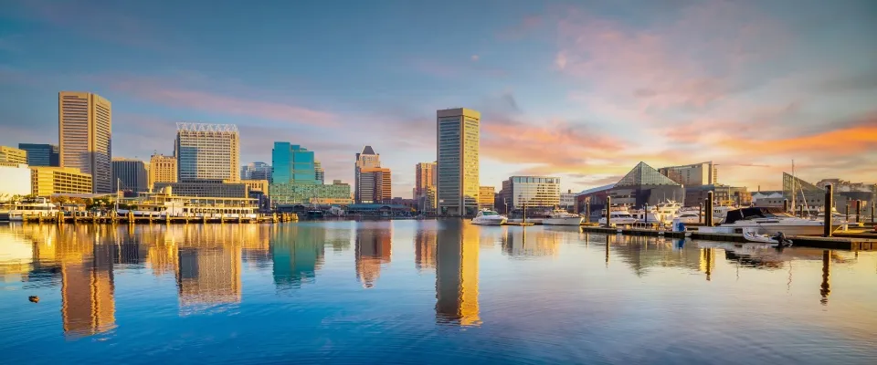 Twilight view of downtown Baltimore, Maryland skyline, representing urban housing activity and insights for a renter engagement tracker.