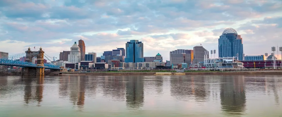 Panoramic sunset view of downtown Cincinnati, representing urban housing trends and city activity for a renter engagement tracker.