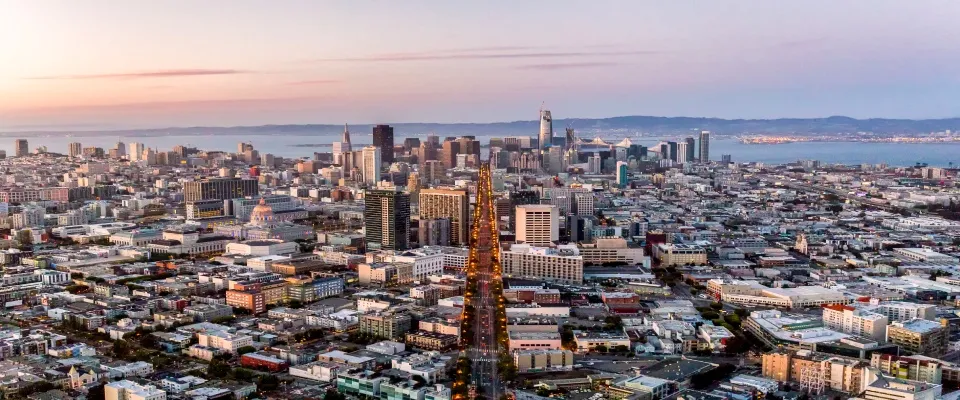 Helicopter view overlooking Market Street toward Oakland, representing urban growth and housing activity for a renter engagement tracker.