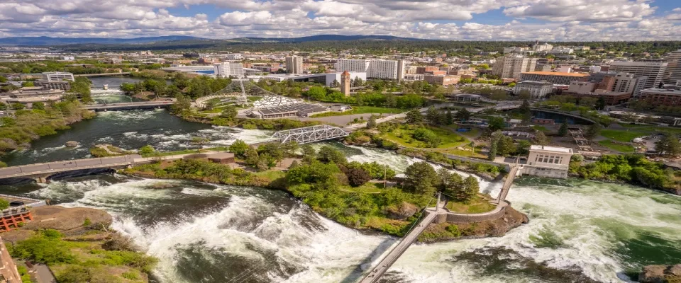 Stunning aerial view of Spokane, Washington, featuring Riverfront Park and the Spokane River, representing urban living trends and insights for a renter engagement tracker.