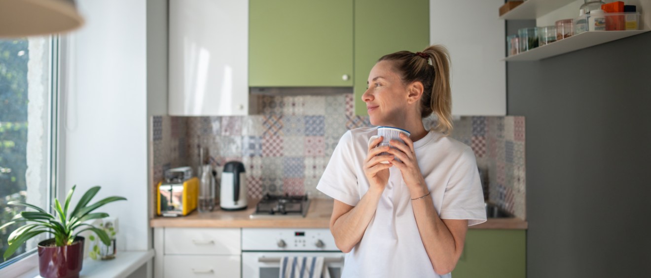 A renter enjoying their morning after transitioning to living alone.
