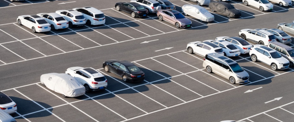 View of a parking lot in a city.