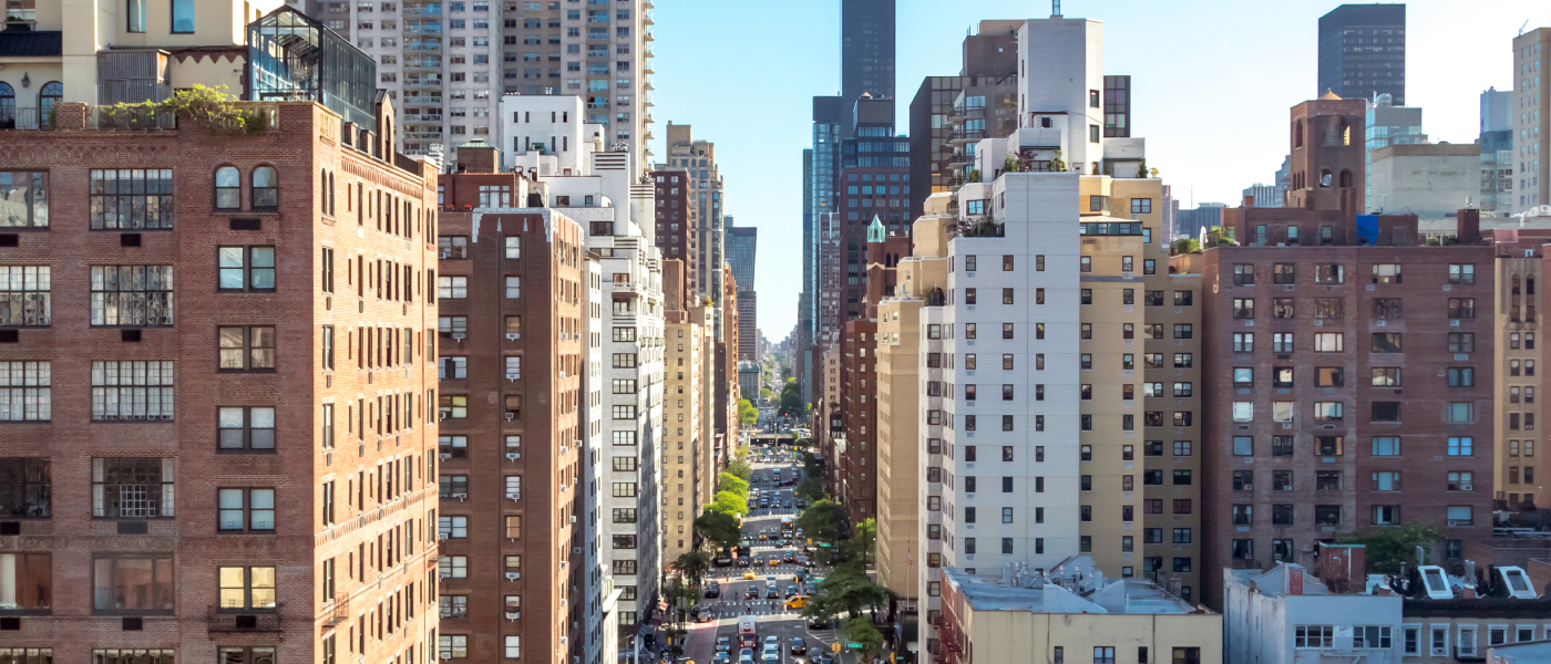 Manhattan’s skyline filled with apartment towers and busy streets, highlighting the borough's rise as one of the hottest rental markets in the U.S. for 2025.