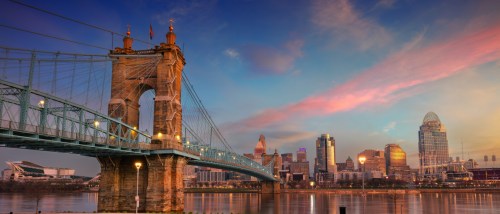 A waterfront view of Cincinnati, a city where the average cost of living is slightly higher than the state average but lower than the national average.