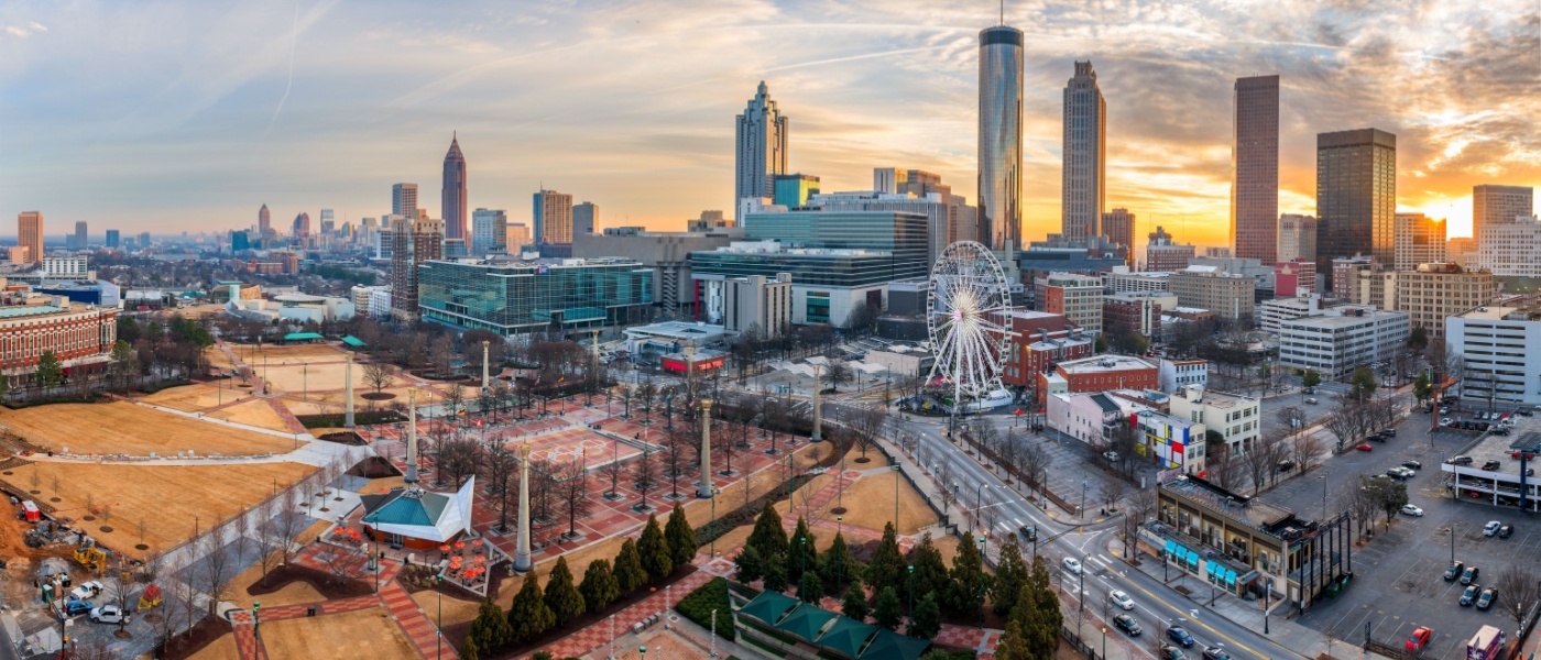 Downtown skyline at dawn showcasing modern high-rise buildings and new apartments in Atlanta as the city begins the day.