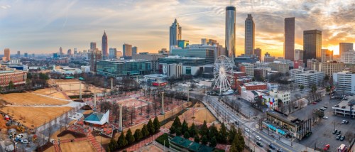 Downtown skyline at dawn showcasing modern high-rise buildings and new apartments in Atlanta as the city begins the day.