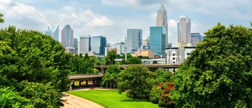 New apartments in Charlotte highlighted by the downtown Charlotte skyline, showcasing the modern cityscape of Charlotte.