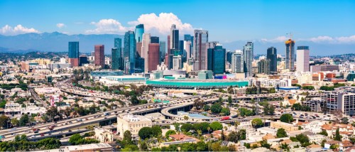 Aerial drone view of Los Angeles, showcasing the city skyline and surrounding neighborhoods, ideal for highlighting new apartments in Los Angeles.