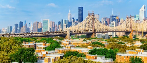 View of the Queensboro Bridge spanning the East River between Manhattan and Queens, a fitting visual for topics related to new apartments in Queens.