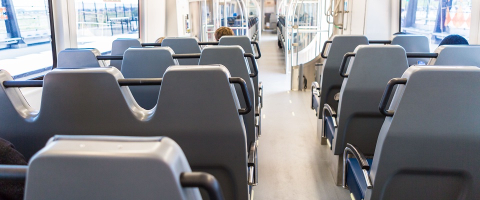 Interior of commuter train from Denver Airport to Denver Union Station to illustrate public transport in Denver.