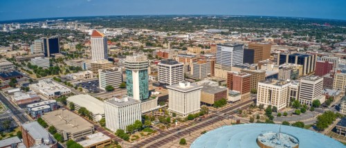 New apartments in Wichita highlighted by an aerial view of the city’s population center, showcasing the urban layout and downtown area of Wichita, Kansas.