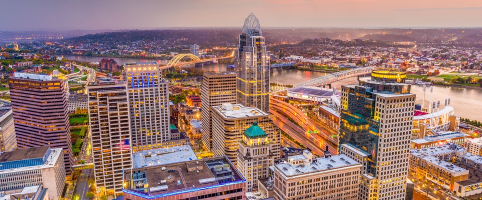 Cincinnati skyline at dusk viewed from above, highlighting why the city ranks among the top cities for urban living and riverfront views.