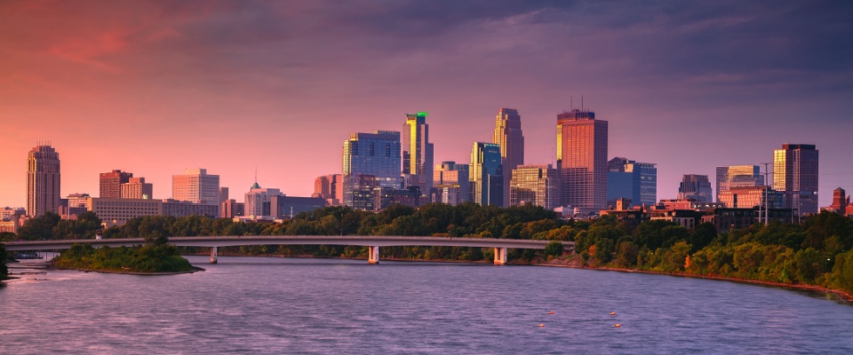 Panoramic autumn sunrise over downtown Minneapolis, Minnesota, highlighting why it’s considered one of the top cities to watch for scenic urban living.