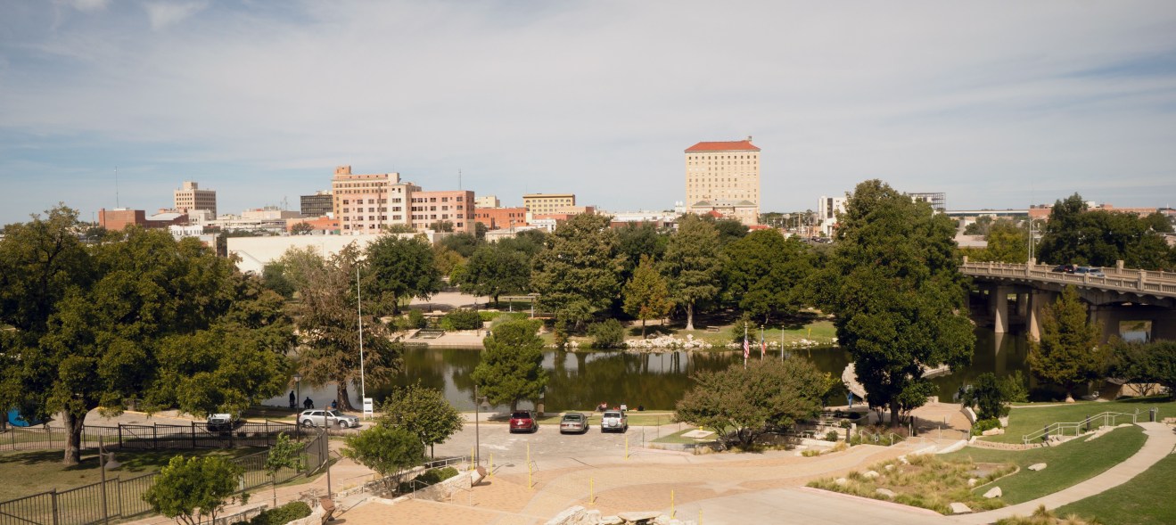 Downtown Lubbock, Texas skyline with city park and surrounding buildings, representing affordable neighborhoods with accessible urban living.