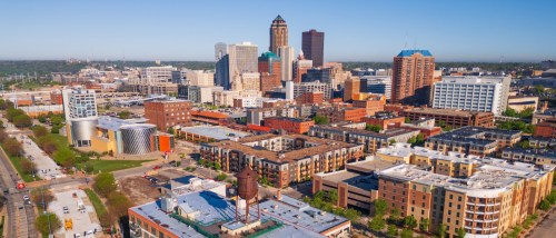 Aerial view of downtown Des Moines, Iowa, highlighting the city skyline and surrounding areas featured among the best affordable neighborhoods for renters.