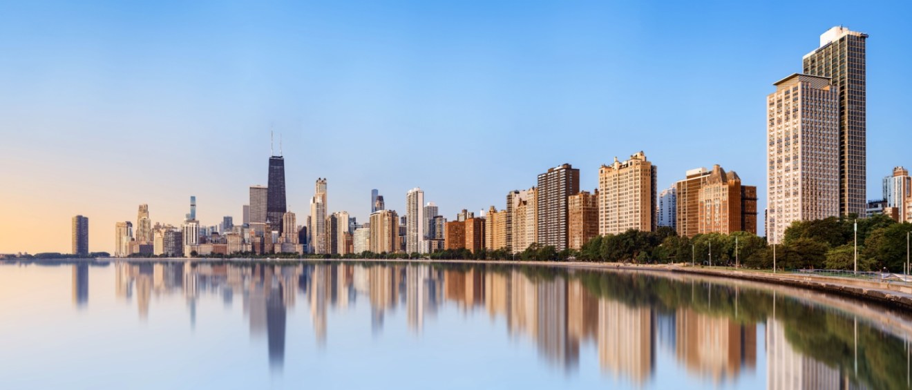 Chicago's skyline at sunrise to illustrate that Chicago is one of the hottest rental markets in the US.