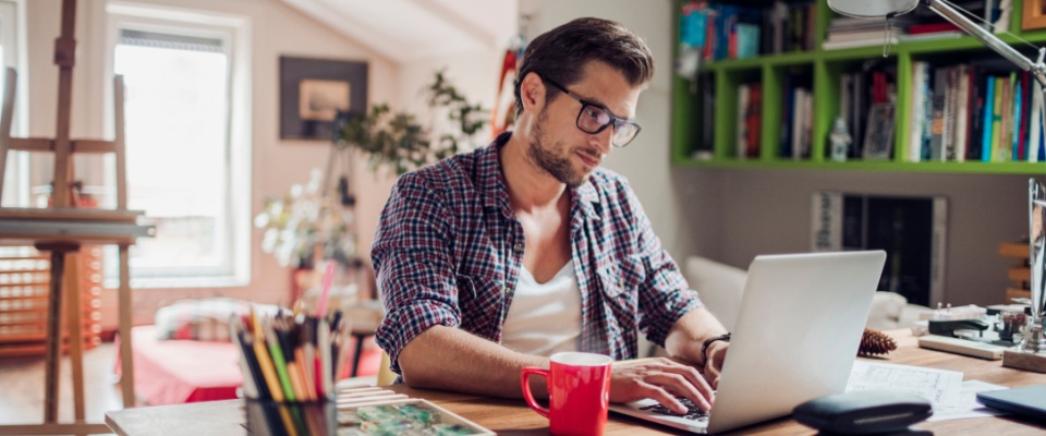 A person working from home in a 1-bedroom apartment.