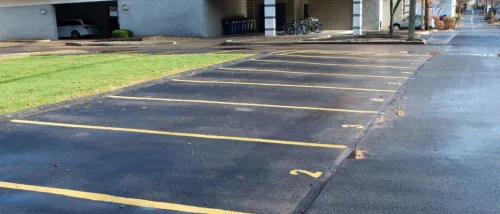 A picture of assigned parking spaces in an apartment community parking lot.