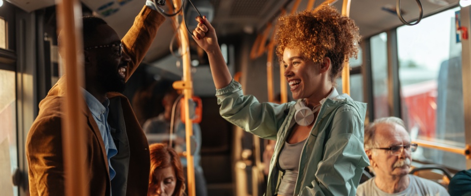 People using public transit in Lansing, MI.