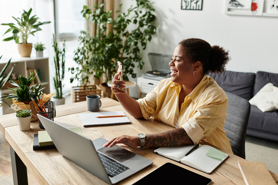 woman working on her side hustle from her apartment