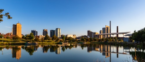 A waterfront shot of the skyline in Birmingham, AL, a city where renters should ask these 5 questions before searching for apartments.
