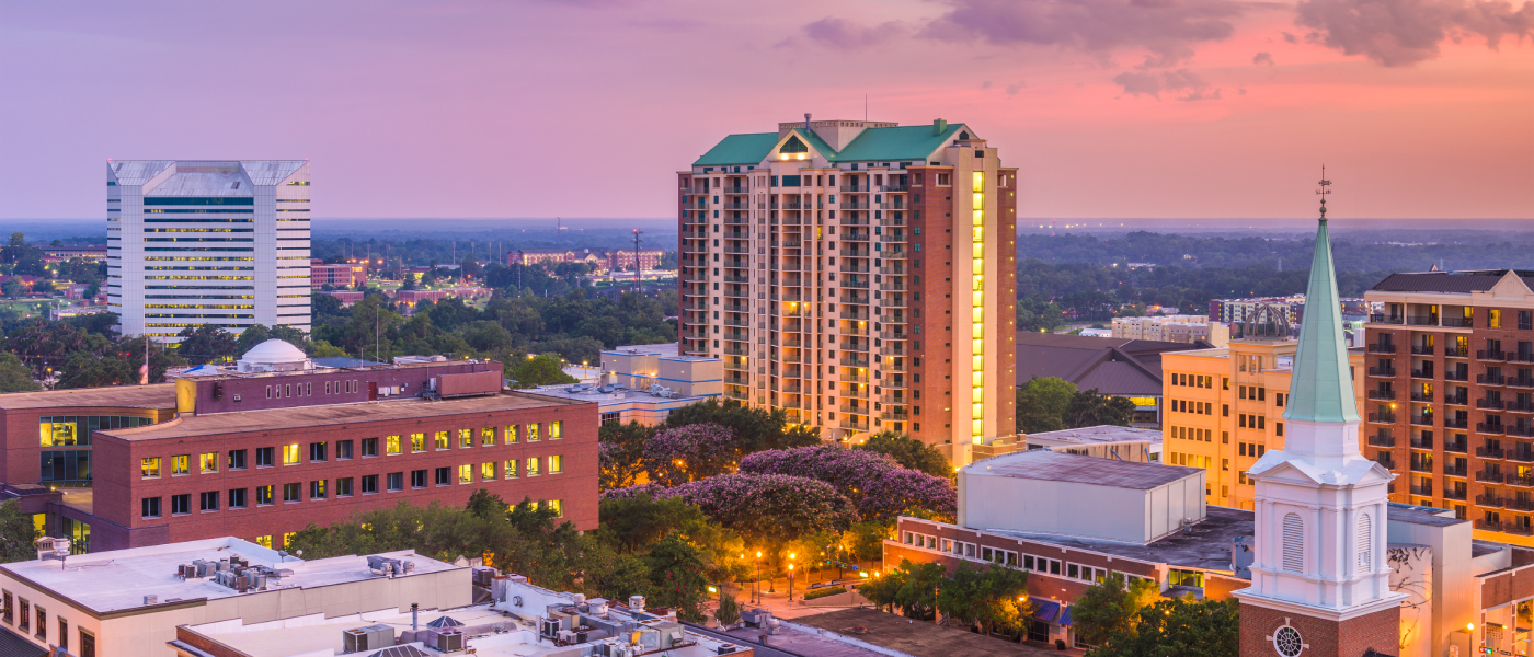 A dusk-time photo of Tallahassee, FL, a city where renters can find affordable neighborhoods with rent prices below the city average.