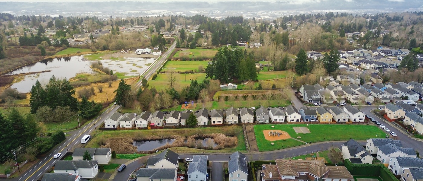 Aerial view of waterfront housing in East Hill to illustrate the best affordable neighborhoods in Kent, WA.
