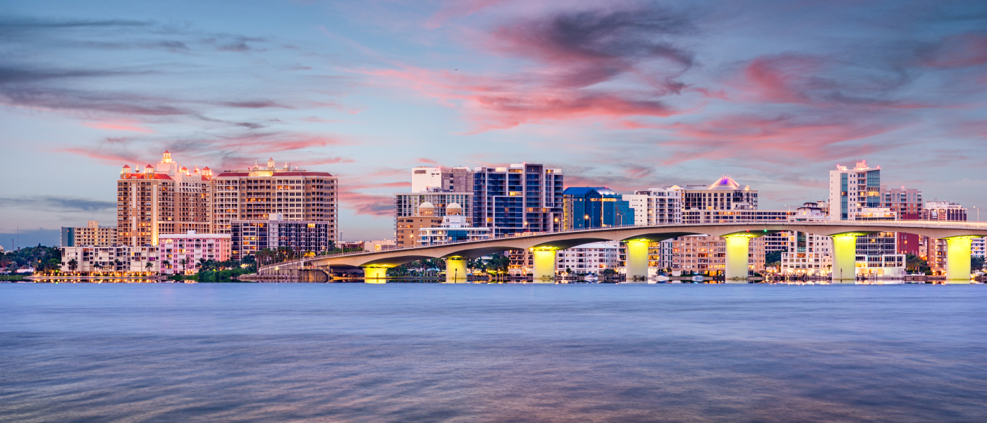 A waterfront shot of the skyline of Sarasota, FL, a city where renters have plenty of public transit options.
