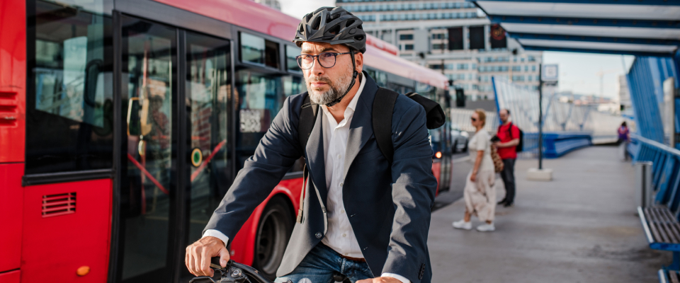 A person using a bicycle as public transit.