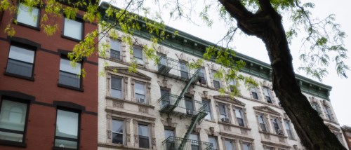 A photo of an apartment building where a renter could find an apartment if their rental history is good enough.