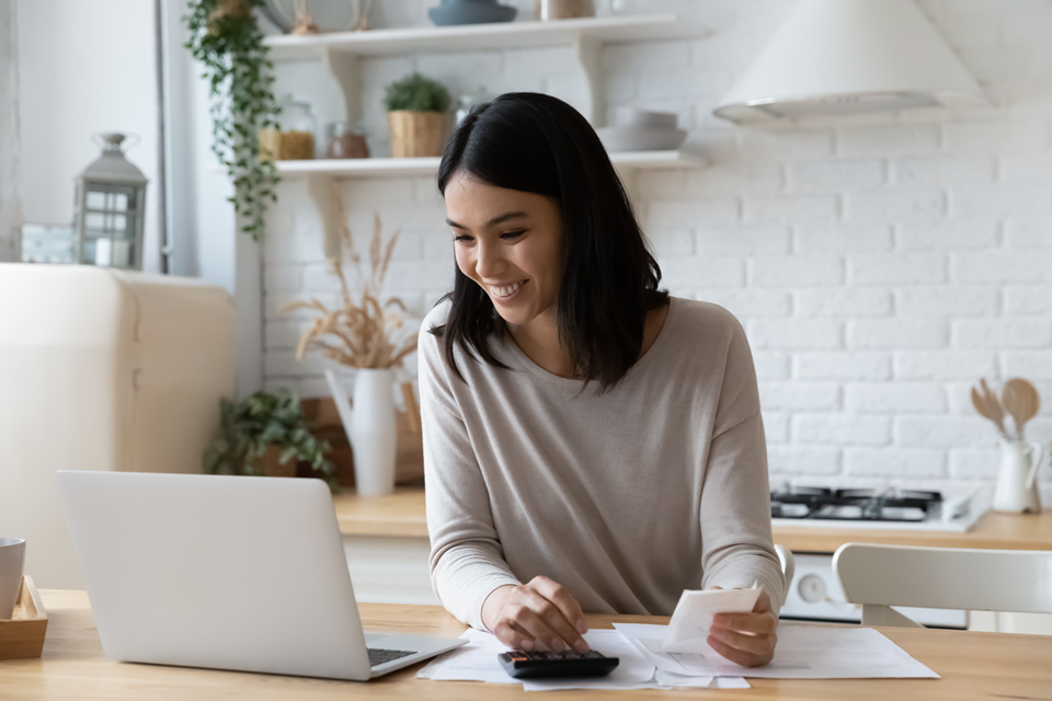 happy person filling out rental application online