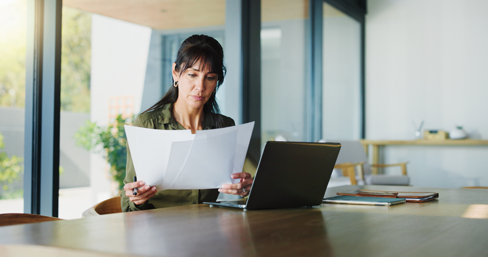 person going through financial statements