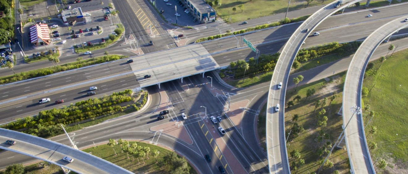 Apartments in McAllen highlighted by a bird’s-eye view of a South Texas roadway interchange, showcasing the city’s connectivity, infrastructure, and surrounding residential areas.