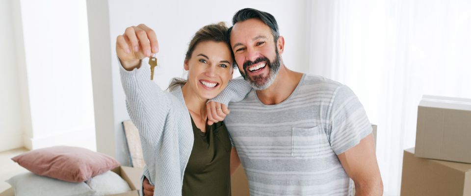 A happy couple after searching for an apartment.