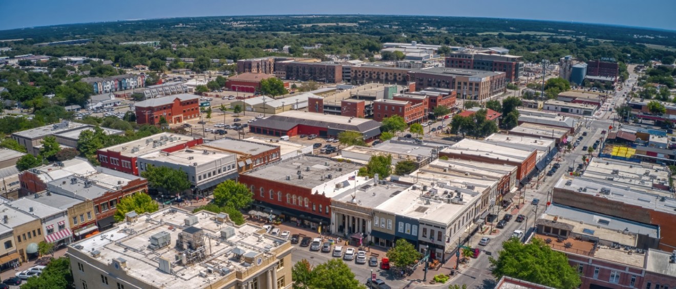 Best cities for renters highlighted by an aerial view of McKinney, Texas, showcasing its growing neighborhoods, green spaces, and renter-friendly community.