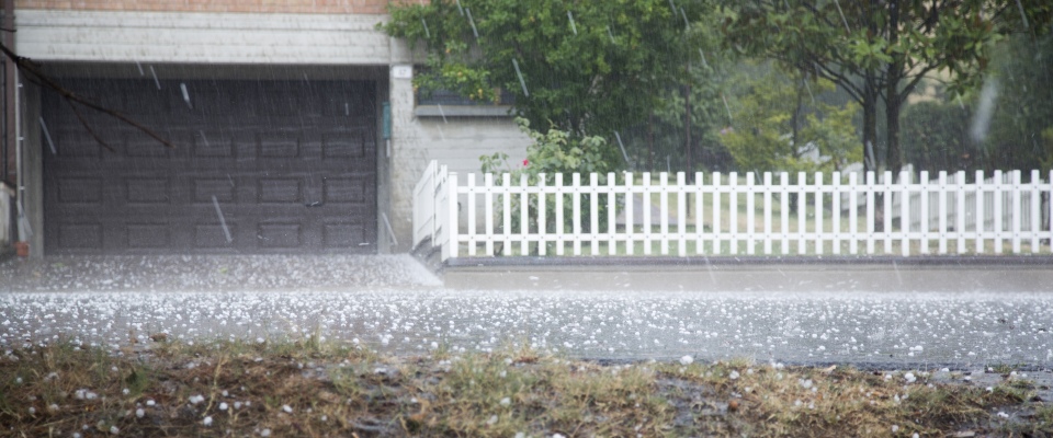 Hail falling from the sky during a storm, highlighting seasonal weather conditions and climate considerations for residents of apartments in McAllen.