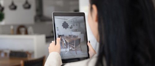 A person looking at a virtual apartment tour.