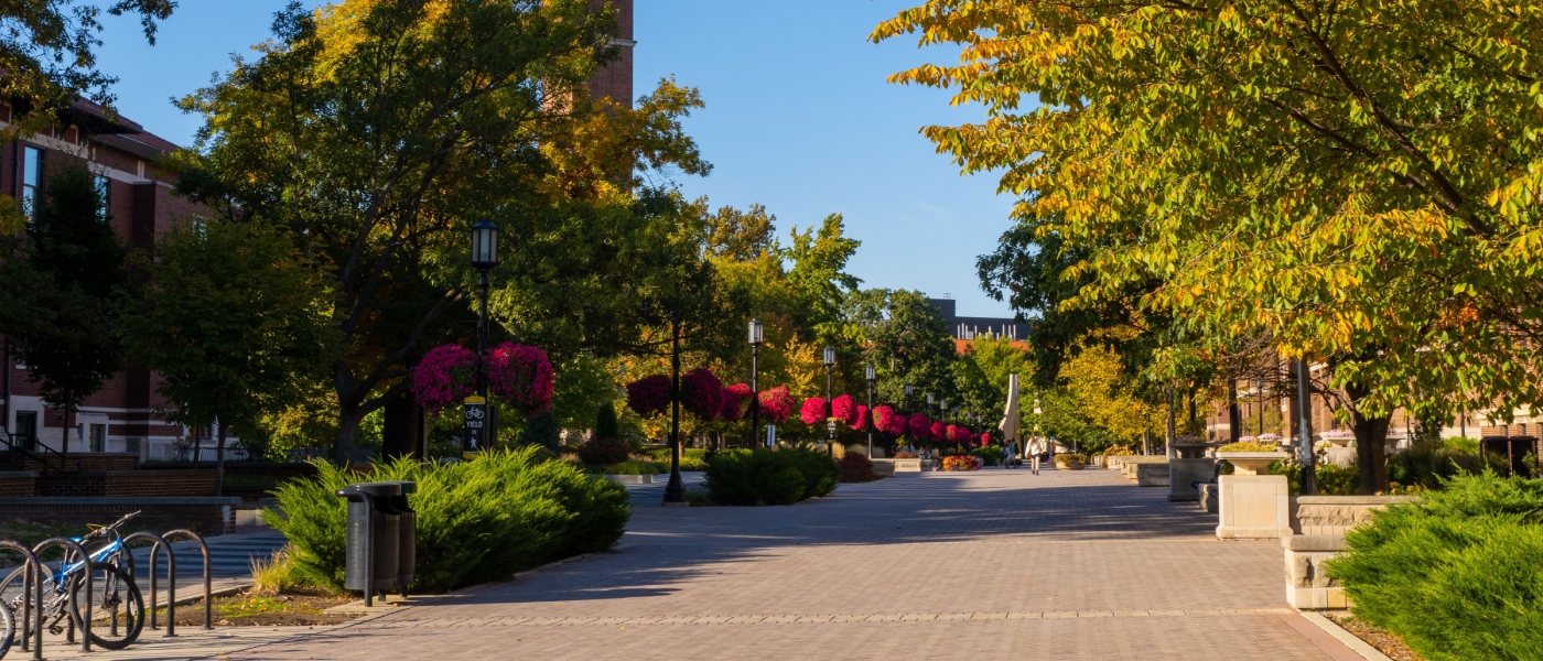 Bell Tower on the West Lafayette campus surrounded by colorful autumn trees, highlighting the local setting and lifestyle tied to the cost of living in Lafayette.