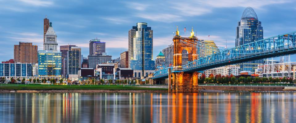 Cincinnati, Ohio, USA downtown skyline and bridge on the river at dusk featured in the renter engagement tracker.