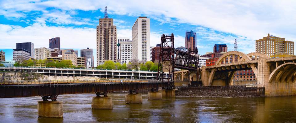 St. Paul city in Minnesota with skyline, skyscrapers, and railroad over the Mississippi River in the Upper Midwestern United States featured in the renter engagement tracker.