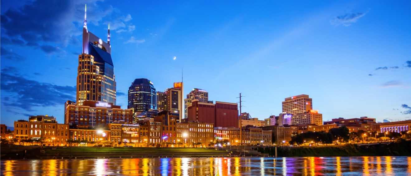 A dusk-time photo of the skyline in Nashville, TN, a city where renters should ask these questions before renting an apartment.