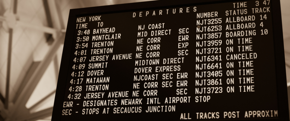 NJ Transit departures board listing train times, destinations and track numbers, part of the Newark public transit network.
